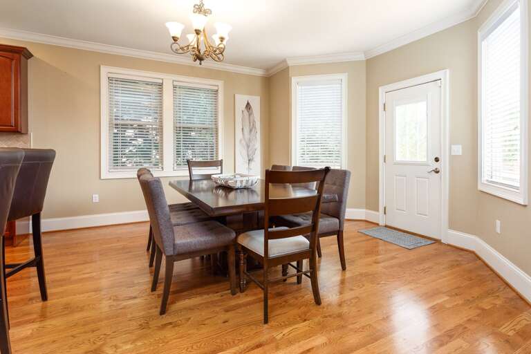 Off of the dining area is a door to the large back deck. Flow freely from the kitchen to the deck for serving al fresco meals and beverages!