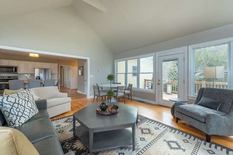 Off of the dining area in the Living Room is a door to the back deck. Flow freely from the Living Room to the deck for grilling and outdoor time!