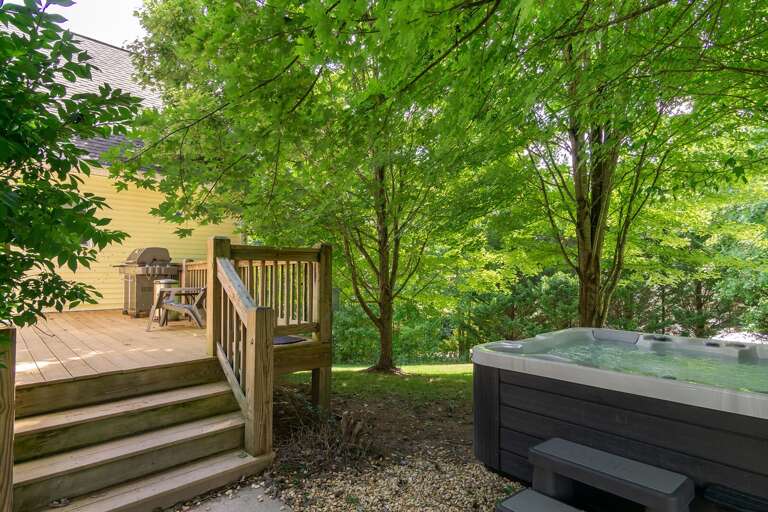 Fire up the gas BBQ grill on the back deck, just steps from the kitchen, dining area and hot tub!