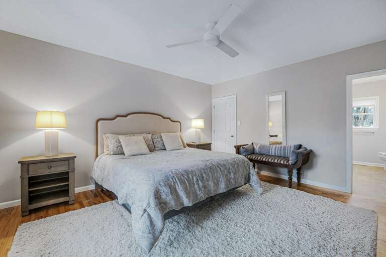 This King owner's suite features an ensuite bathroom and 55” Roku HDTV. Its main floor location offers convenient access to the common spaces.