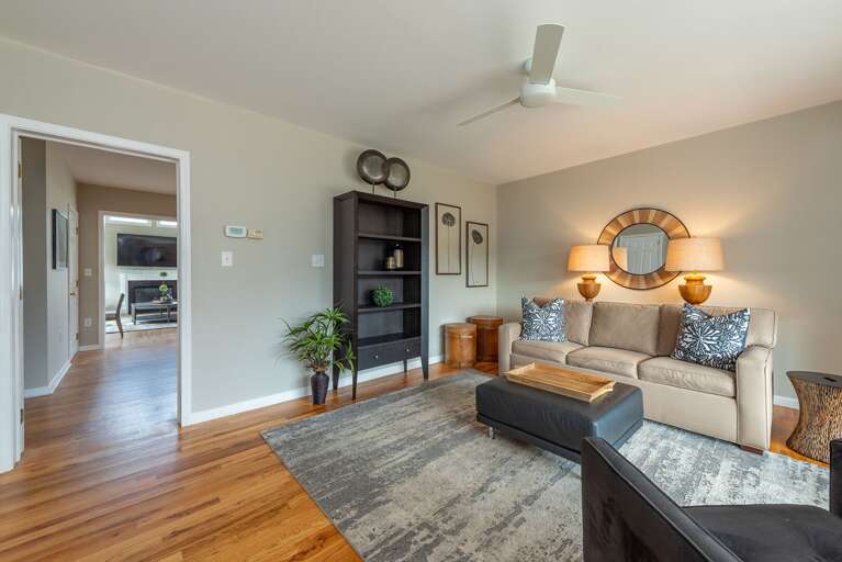 The separate Sitting Room off the kitchen is perfect for groups who like to gather in multiple areas! The full sofa bed is located in this room.