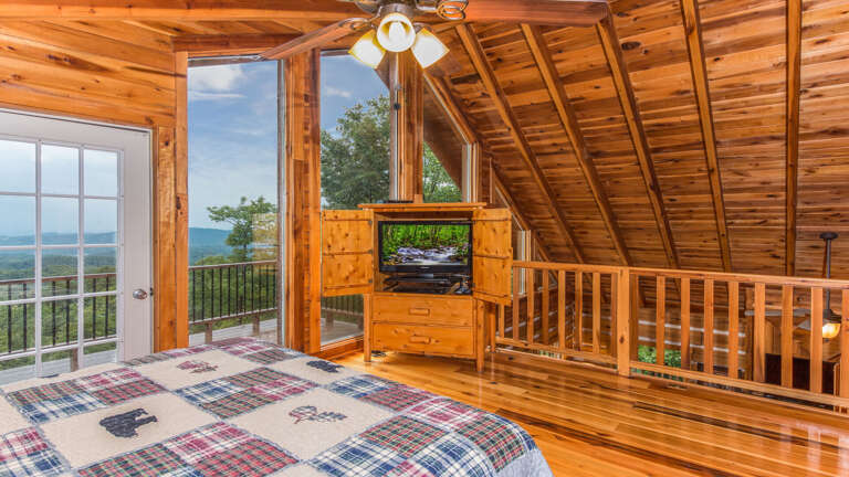 Wooden Interior Bedroom With Large Windows And Mountain View