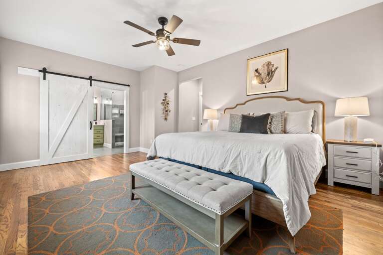 This King owner's suite features an ensuite bathroom and 55” Roku HDTV.