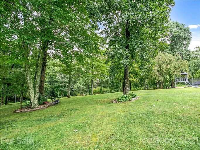 There is no shortage of trees on this property. While fall, summer & late spring display the richest foliage, you'll enjoy the natural beauty that surrounds you – no matter the season.
