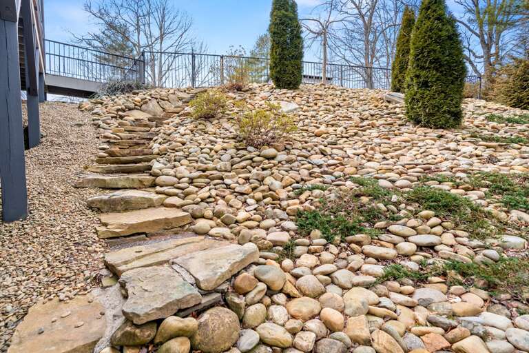 Travel effortlessly from pool to hot tub by way of this convenient stone path.
