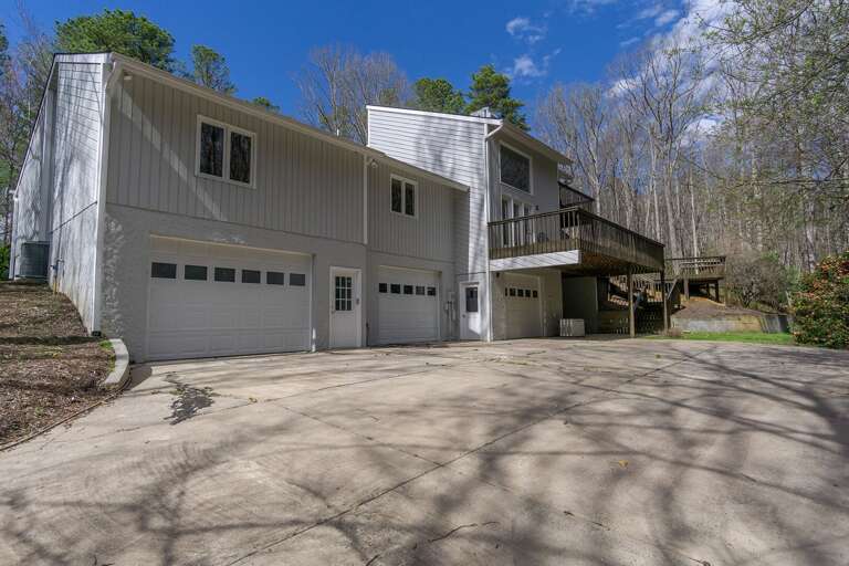 Multiple garages on this property (3 on the side + 1 in the front) provide covered parking for a total of 6 vehicles.