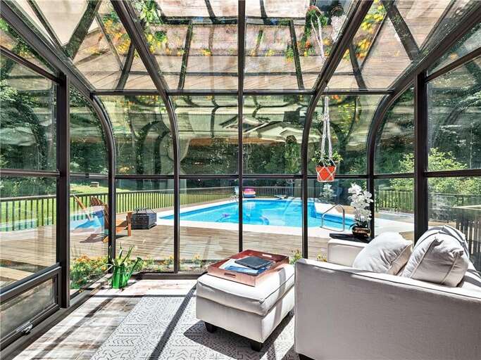 This sun-soaked space is a tranquil setting for a nap or reading time.