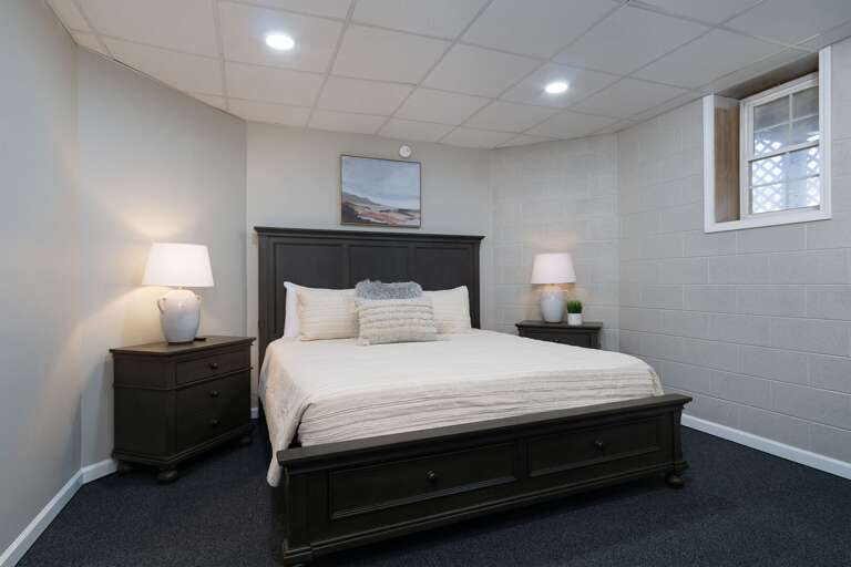 The basement level contains 2 king bedrooms with windows in each, along with a shared bathroom.