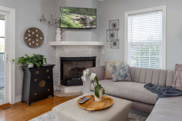 Get cozy in the living room! The gas fireplace and Roku HDTV will make you never want to retreat from the comfort of this space. Get cozy in the living room! The gas fireplace and Roku HDTV will make you never want to retreat from the comfort of this space.