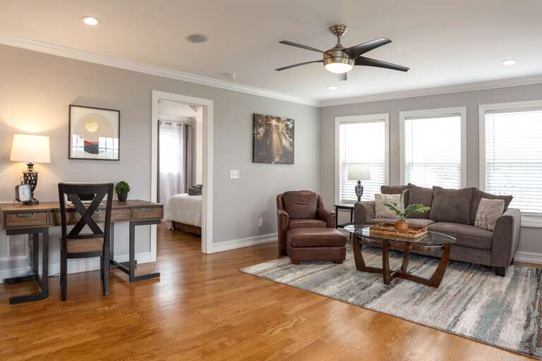 This Sitting Room is perfect for quiet gatherings upon waking up in the morning in the upper level bedrooms.