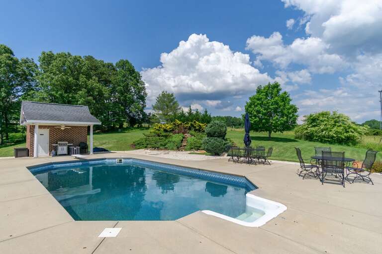 Kids love exploring the expansive yard, walking the property, watching fish in the pond & playing under the trees.