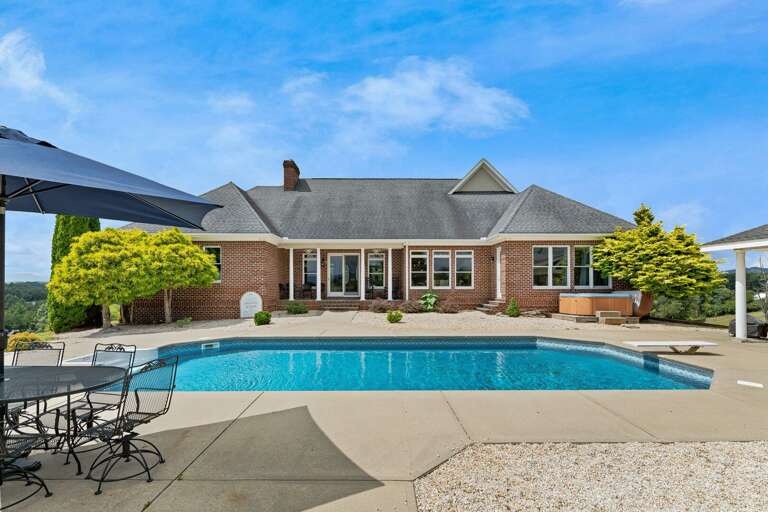 With plenty of pool-side seating, you will relish in the unbeatable views of Blue Ridge Pool House.