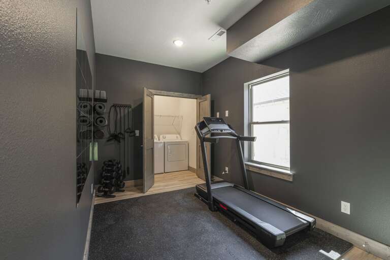 Home Gym Room With Treadmill And Weights