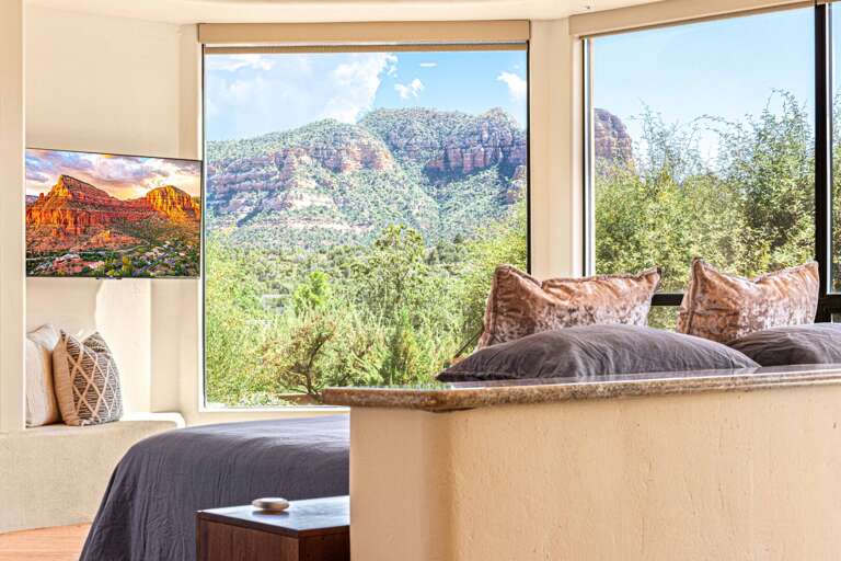 Bright Bedroom Boasting Breathtaking Views Through Big Windows Bright Bedroom Boasting Breathtaking Views Through Big Windows