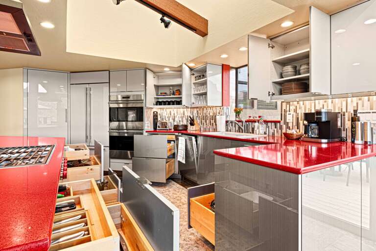 Fully Stocked Kitchen with Professional Cookware and Complete Dinnerware.