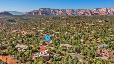 Two Luxury Homes Across from each other. 12 Bedrooms, 8 Bathrooms, and 2 Half-Baths.