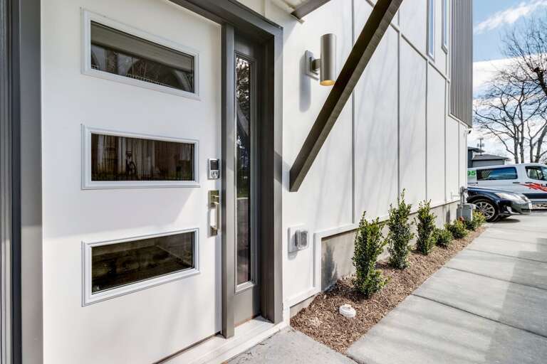 The front door has a keypad lock for 24/7 access by guests