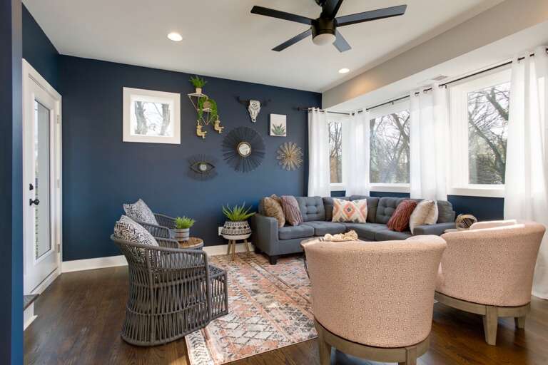 - Bright, eclectic lounge with bold wall art and cozy seating made for conversation - Wraparound windows fill the space with natural light and relaxing views - Stylish blend of texture, color, and comfort, perfect for coffee, chats, or chill time