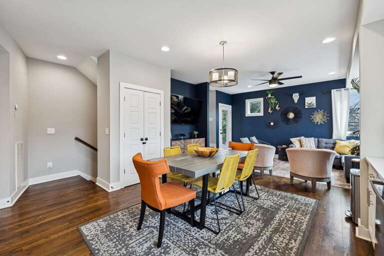 - Kick back in this bold, artful lounge with cozy textures &amp; eye catching decor - Sunlight pours through wraparound windows, filling the space with warmth - Perfect for game nights, lazy mornings, or vibing with your favorite playlist