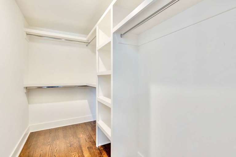 Massive walk-in closet for suitcases and clothes