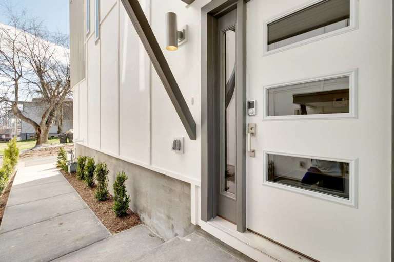 The front door has a keypad lock for 24/7 access by guests