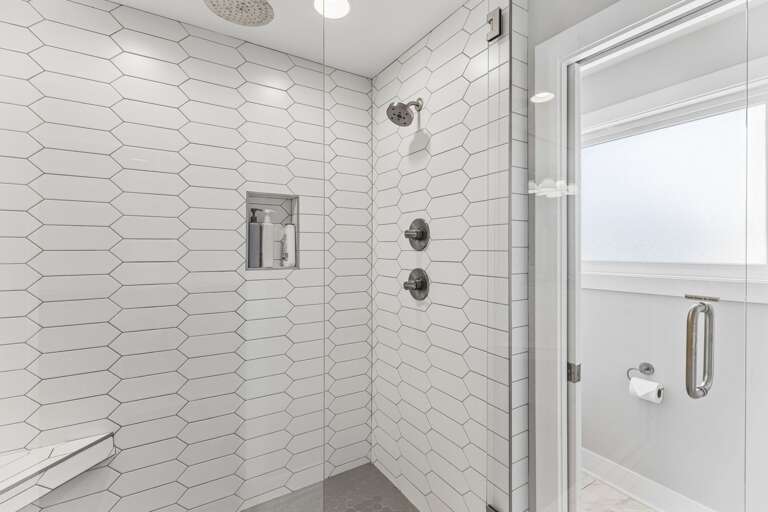 Share the master ensuite without the wait — double vanity, quartz counters, and enough mirror space so no one's elbowing anyone out of the way.