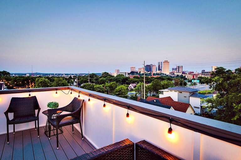 Enjoy evening sunsets on the rooftop deck boasting one of the highest points in the neighborhood!