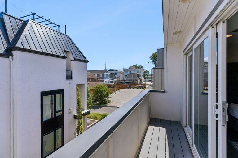 Your front-row seat to the Nashville skyline — 1.5 miles from downtown, visible from the primary bedroom patio every single day.