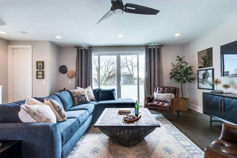 The living area sectional sofa converts to a queen bed