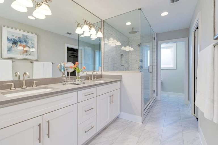 Master bathroom with counter to ceiling full length mirror
