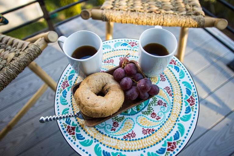 Enjoy your morning coffee on the front patio in our quiet neighborhood