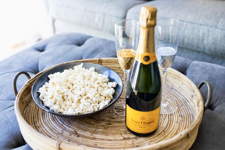 - Cozy up with a bottle of Veuve Clicquot and freshly popped popcorn for a beautiful movie night in - Stylish woven tray adds a rustic touch to your modern living space - Perfect setup for romantic evenings or laid back celebrations  