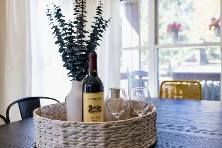 - Start your stay with a bottle of Merlot and glasses set for an unforgettable evening - Dappled light, eucalyptus stems, and thoughtful touches create instant comfort - Picture perfect setup for connection, conversation, and celebration