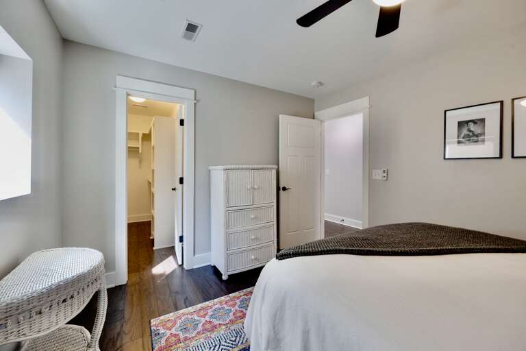- Wake up in style with sunlight pouring into this chic and cozy bedroom escape - Unpack and feel at home with a spacious walk in closet and wicker dresser - Every corner is designed for ease, comfort, and that “I could live here” vibe