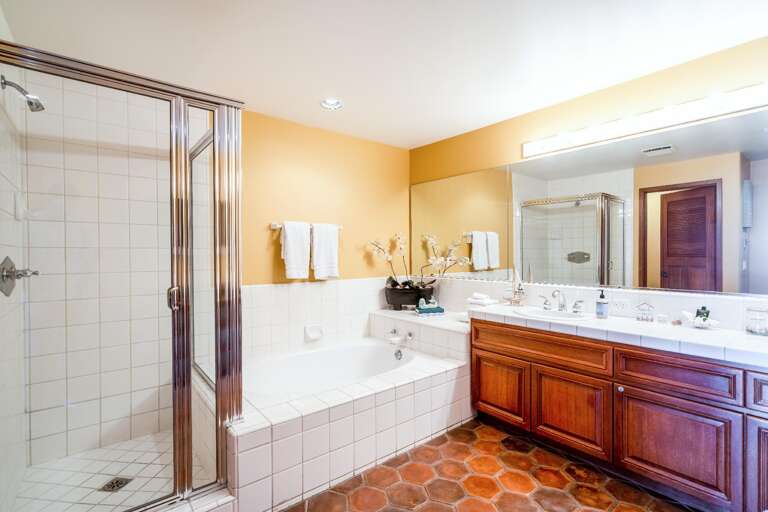 Master bath with bath and walk in shower is attached to the master bedroom and ready for you to enjoy. The master bath also features double sinks.  Master bath with bath and walk in shower is attached to the master bedroom and ready for you to enjoy. The master bath also features double sinks.