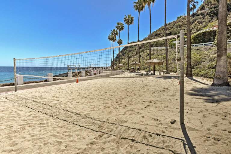 Full size Beach volleyball overlooks the ocean Full size Beach volleyball overlooks the ocean