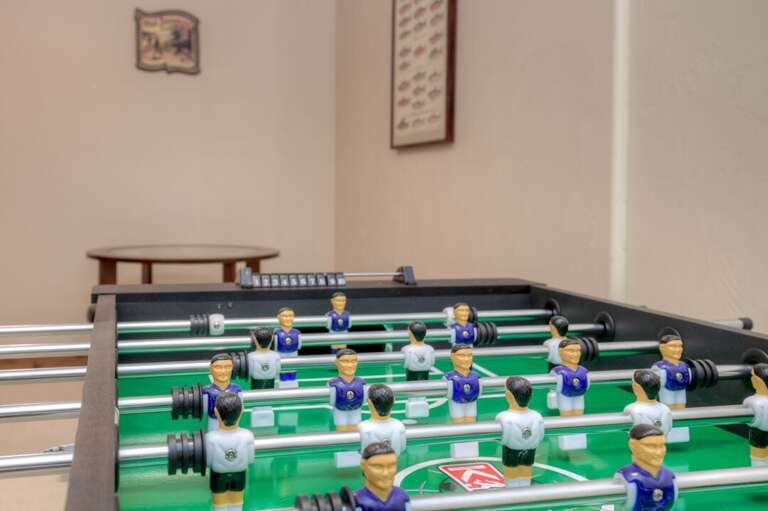 Play a round of foosball | Lower Level Play a round of foosball | Lower Level