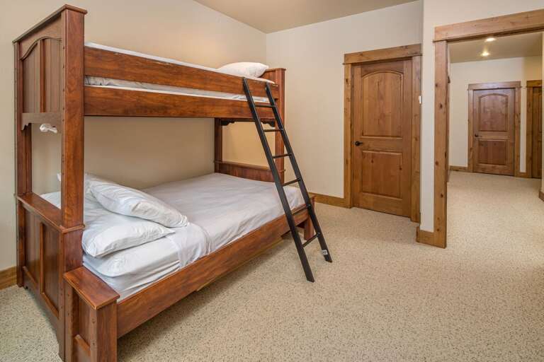 Have a sleepover | Queen-under-twin Bunk Bed | Lower Level