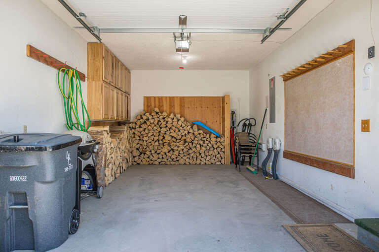 Garage is available for one small car and is used to store firewood!
