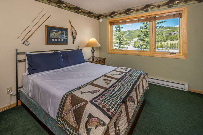 The main floor bedroom | Queen-sized bed | Main Level The main floor bedroom | Queen-sized bed | Main Level