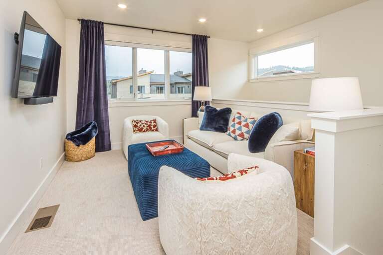 Cozy up in the second living area | Upper Level