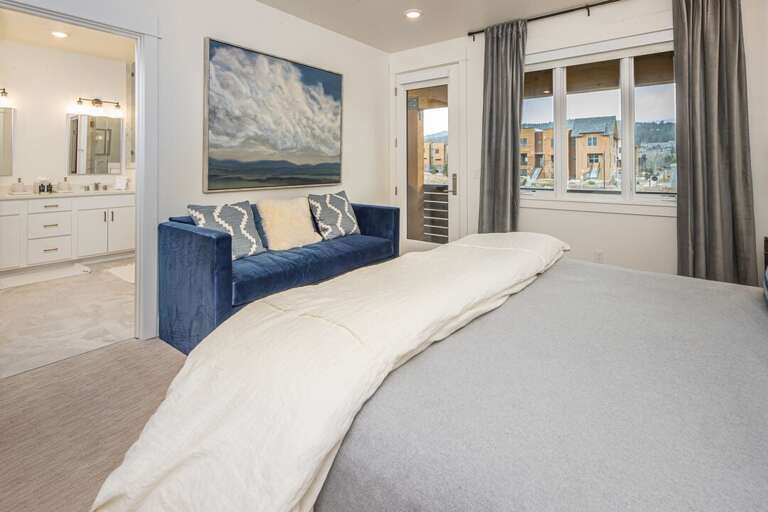 Read a book on the luxurious velvet sofa | Upper Level