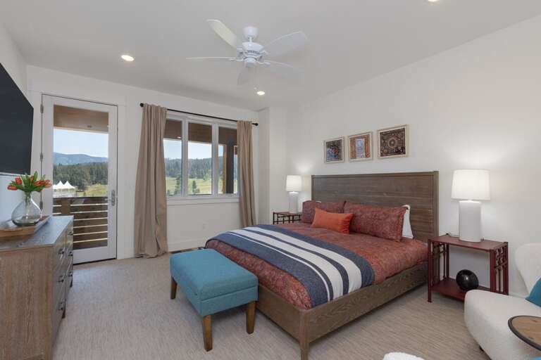 Hop in the comfy king-sized bed | Upper Level