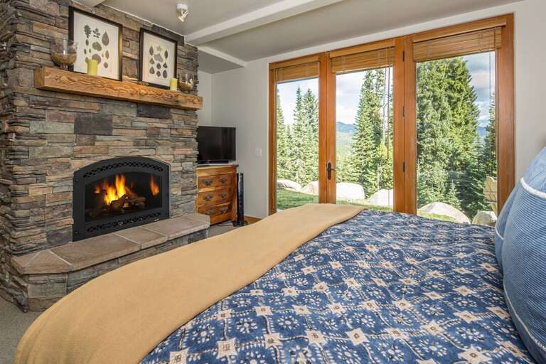 Get cozy in bed with a fire | Lower Level Get cozy in bed with a fire | Lower Level