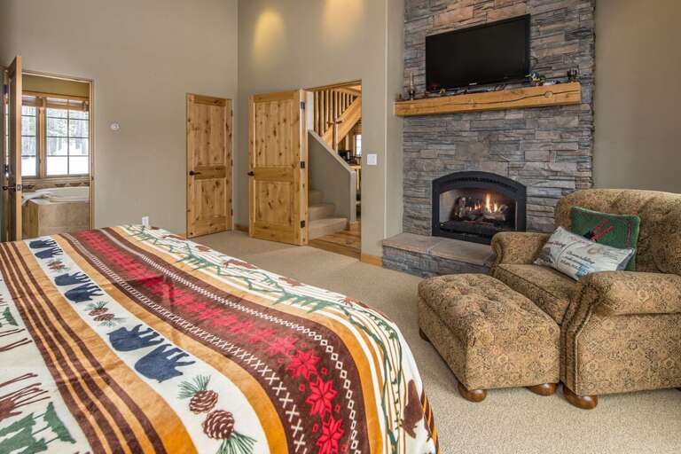 Relax and watch a movie with the fire on | Main Level