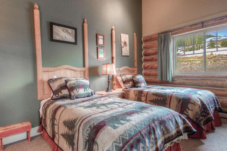 Two twin beds are perfect for kids | Second Bedroom | Two Twin-sized beds | Main Level