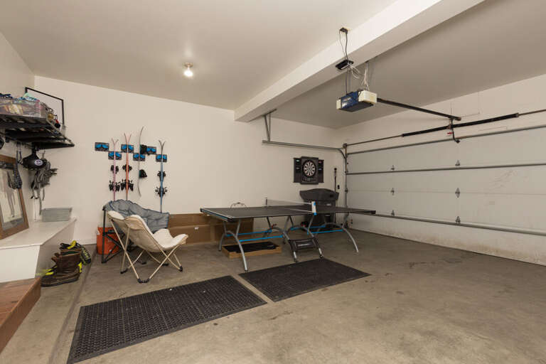 Garage Access and Ping-pong Table | Lower Level Garage Access and Ping-pong Table | Lower Level