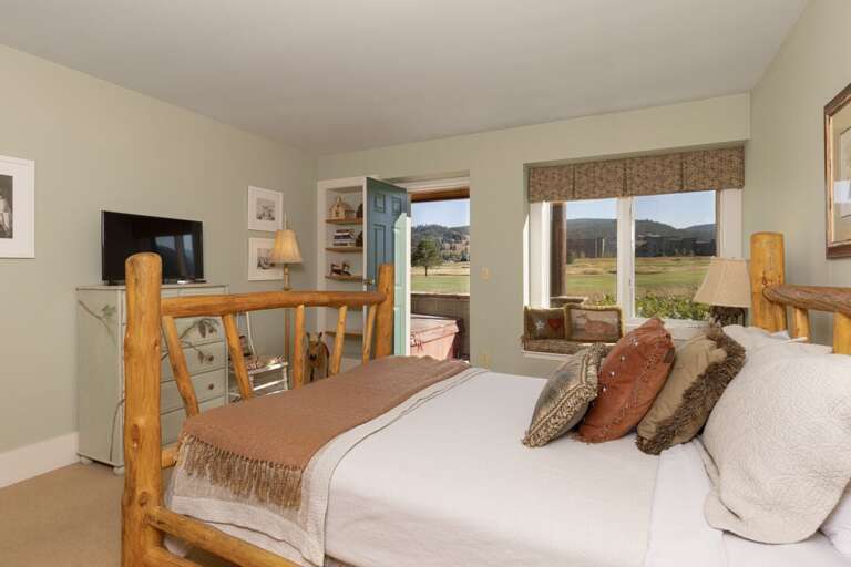 Take a dip in the hot tub | Queen-Sized Bed | Lower Level