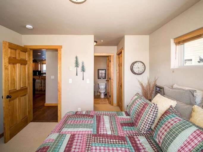 Get cozy in the king-sized bed | Main Level Get cozy in the king-sized bed | Main Level