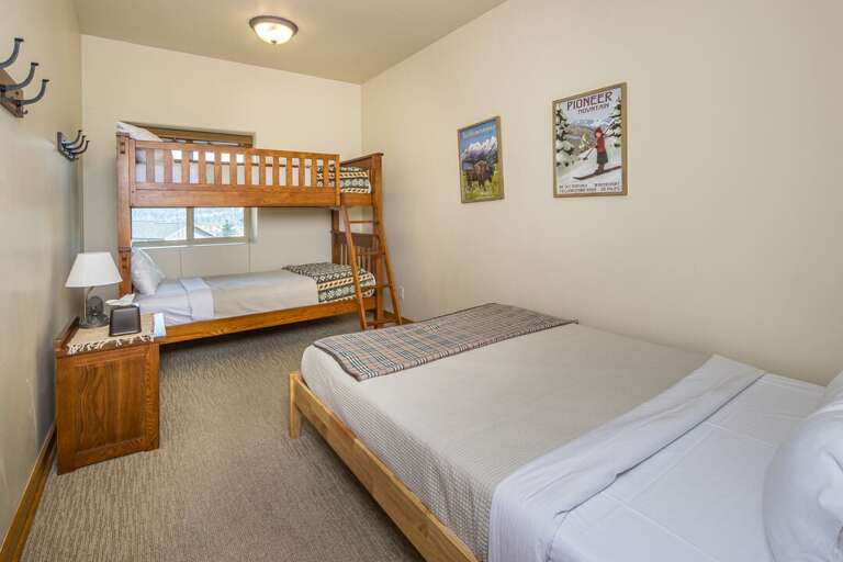 The bunk room is perfect for kids| Queen-size bed and Twin Bunk Bed | Lower Level The bunk room is perfect for kids| Queen-size bed and Twin Bunk Bed | Lower Level